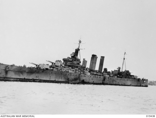 An image of damaged HMAS Australia after her return from the allied invasion of the Philippine Islands.