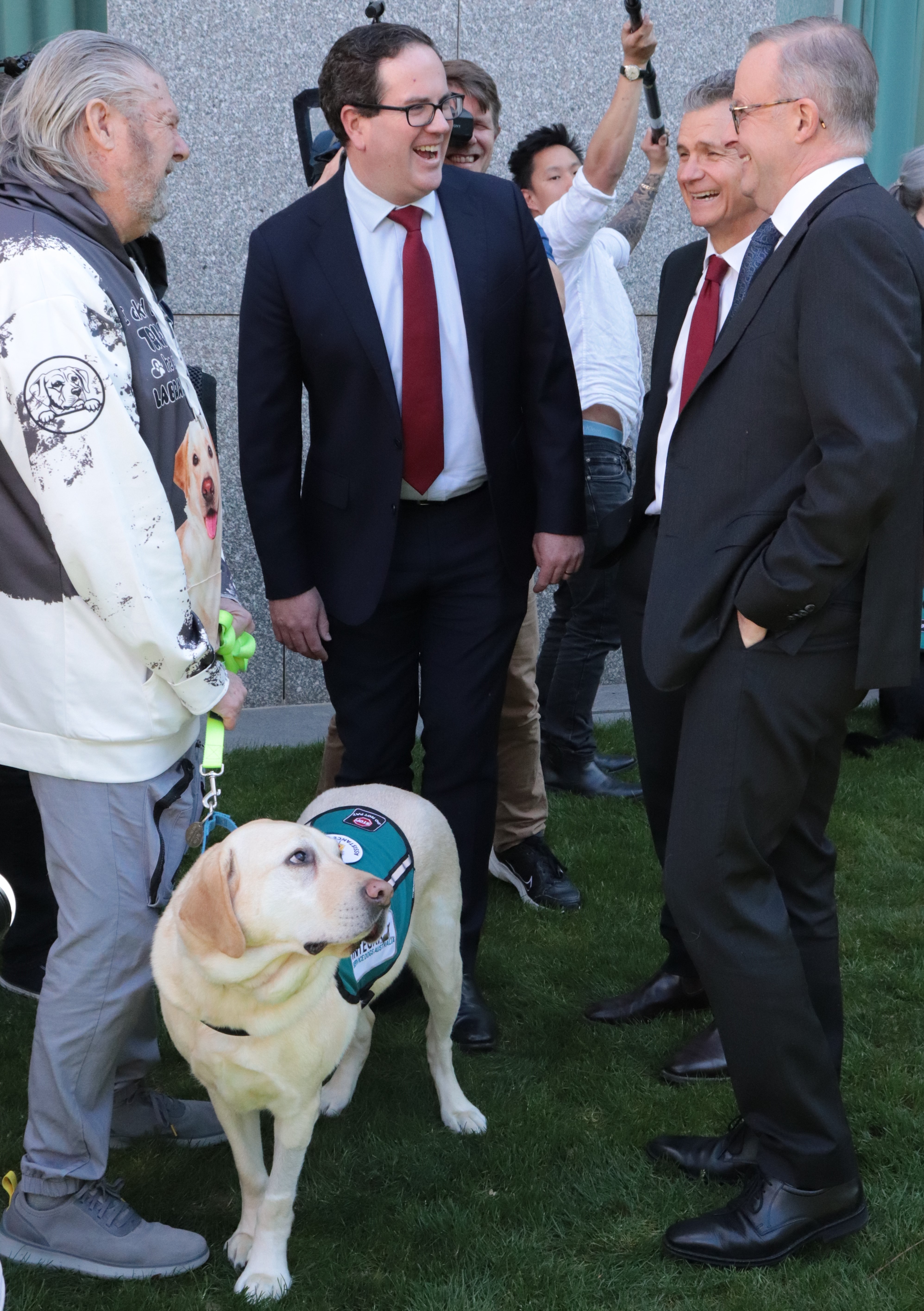 Veteran and Assistance Dog with Prime Minister, Minister and Assistant Minister 