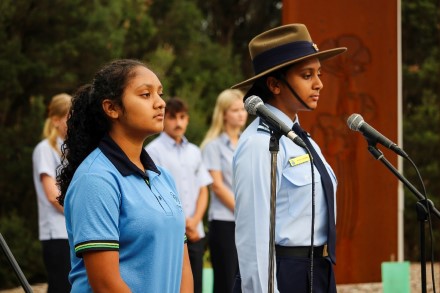 Year 8 student Risha (left) and Year 10 student Rijul at the Anzac Day Assembly