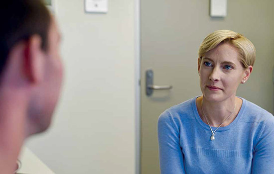 Health provider listening to a patient