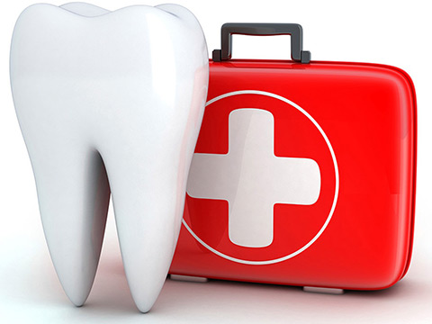 A large tooth and a first aid kit