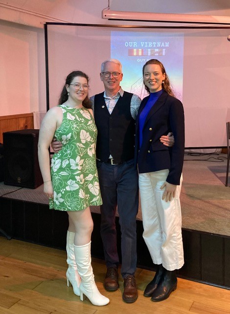 Guy Hall with daughters Meredith (left), who illustrated the book, and Miriam, who designed its cover.