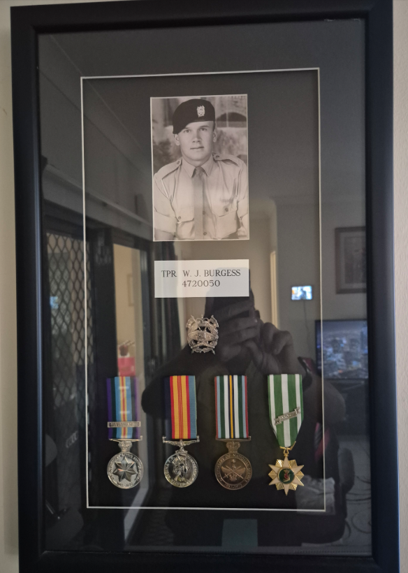 Image of picture frame and service medals 