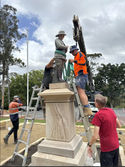 Digger statue being re-erected at the Manly War Memorial. 