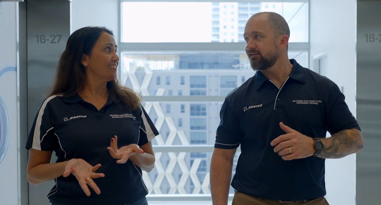 Rachel Leal and David Bragg from Boeing Defence Australia deliver a presentation.