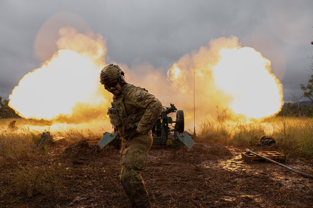 Gunner Floyd Everuss of 4th Regiment, Royal Australian Artillery, fires an M777A2 155mm howitzer. (Photo by Corporal Guy Sadler; Defence)