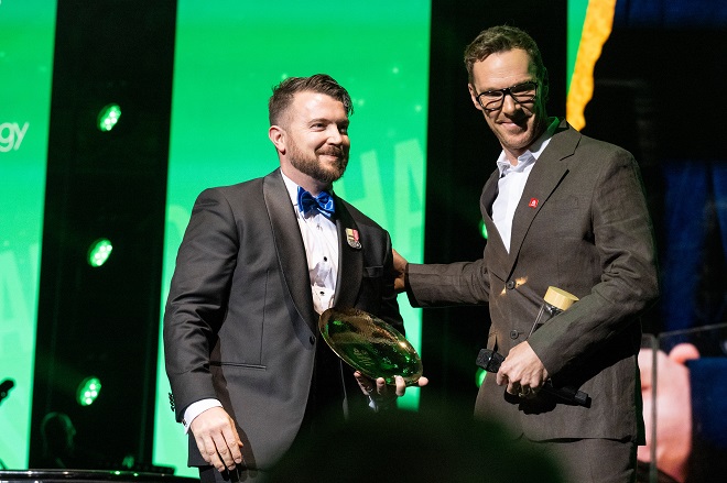 Shannon Lemanski receives his award from actor Benedict Cumberbatch.