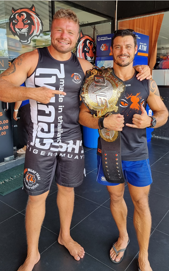 Shaun Kober with One Championship three-weight-division World Champion Anatoly Malykhin.