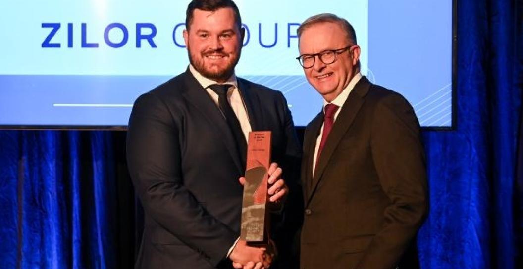 Jake Milazzo of Zlor Group receives an award from Prime Minister Anthony Albanese