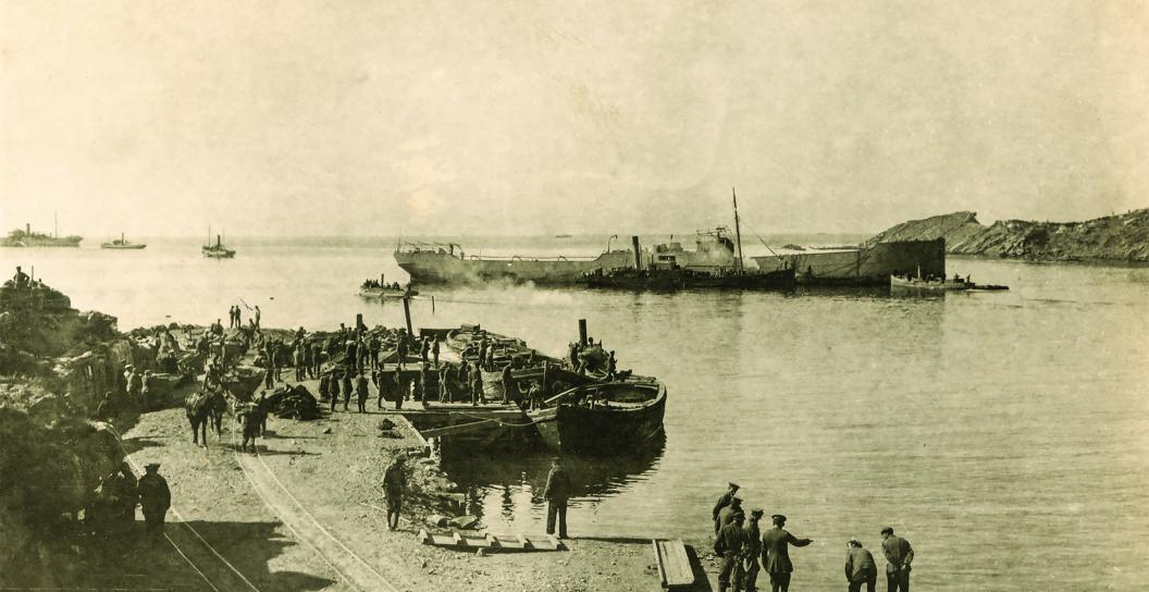 Soldiers of the 1st R.A.N.B.T placing an old hulk ashore in position for outer breakwater to Boat Docks at West Beach, Sulva, Gallipoli
