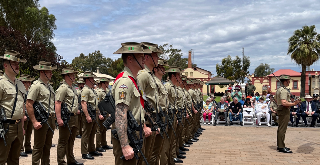Members of 7th Battalion Royal Australian Regiment form the Guard of Honour at the Port Augusta War Memorial