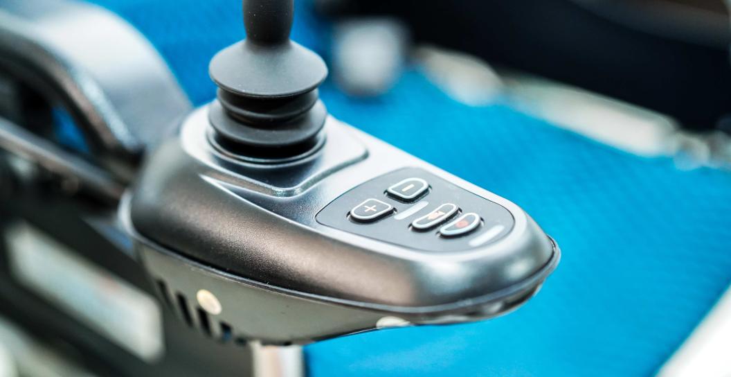 Arm rest of electric wheelchair with joystick and buttons