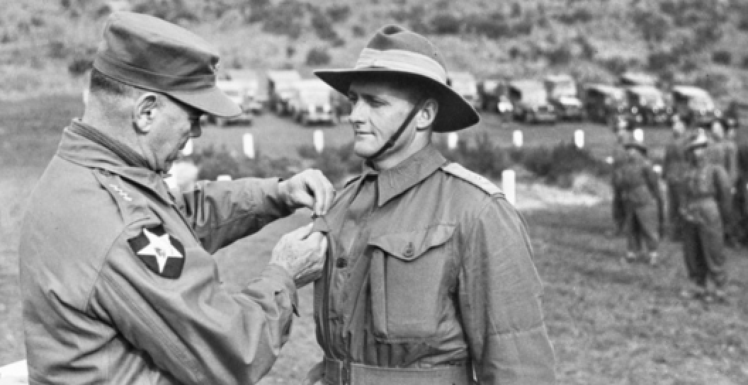 A photo of a soldier receiving a media