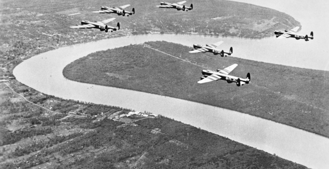 Black and white photograph of Moore leading a formation coming home from a strike.