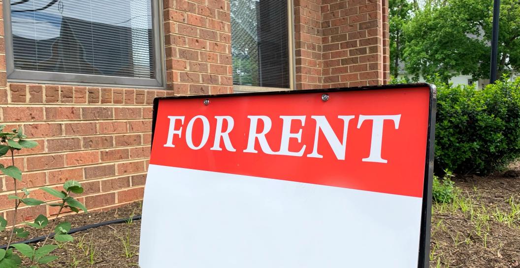 For rent sign outside property