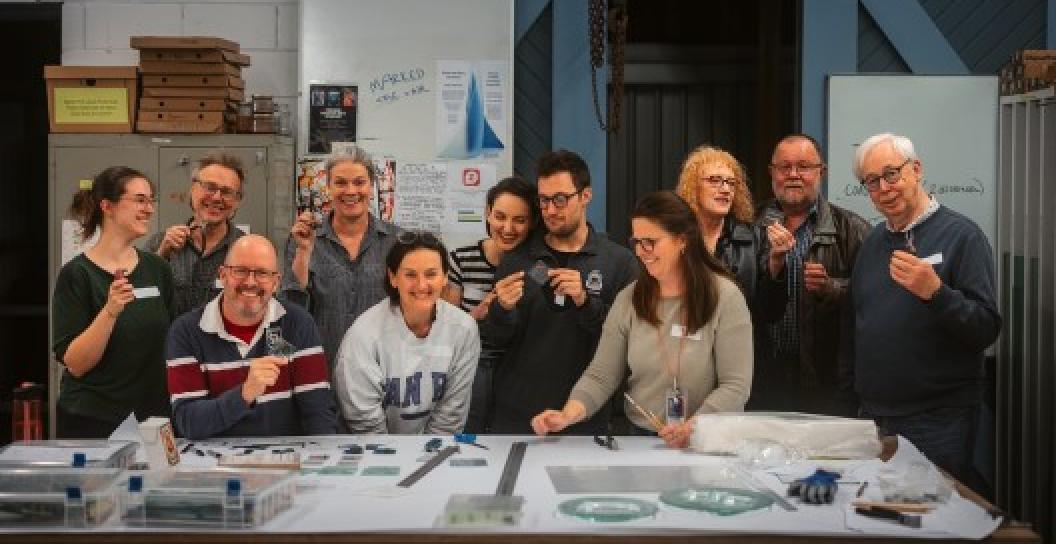 FOVA25 team and workshop leaders participating in a celebratory glass workshop at Glass Works.