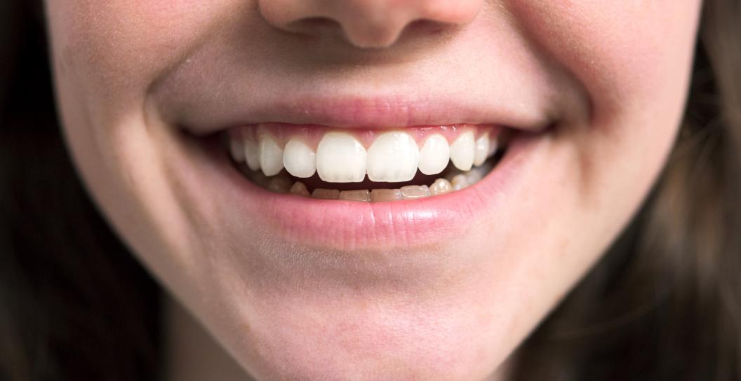 Close of up teenager's face smiling