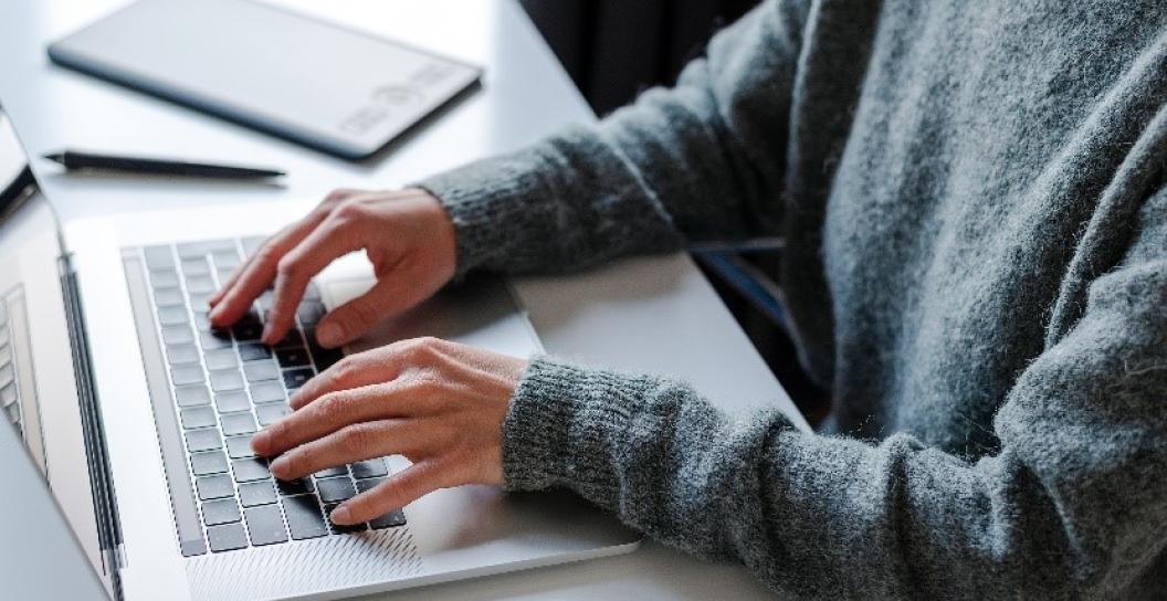 Image of person on laptop