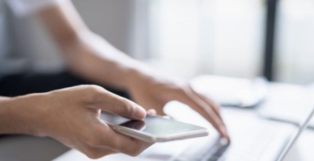 Image of laptop and phone