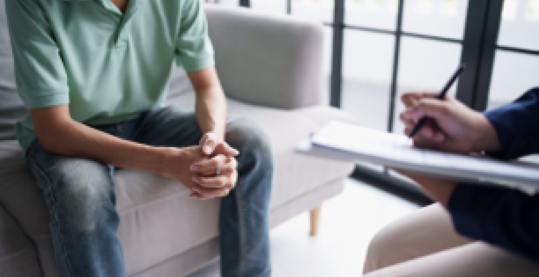 Man in therapy session