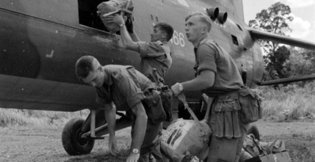 Photo of soldiers exiting a helicopter