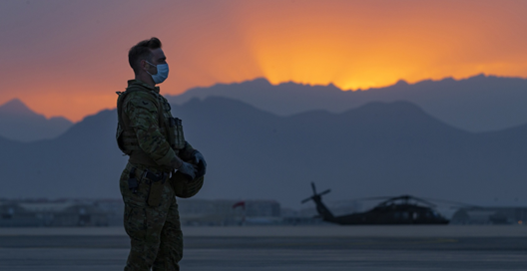 Silhouette of an Australian soldier at sunrise in Afghanistan
