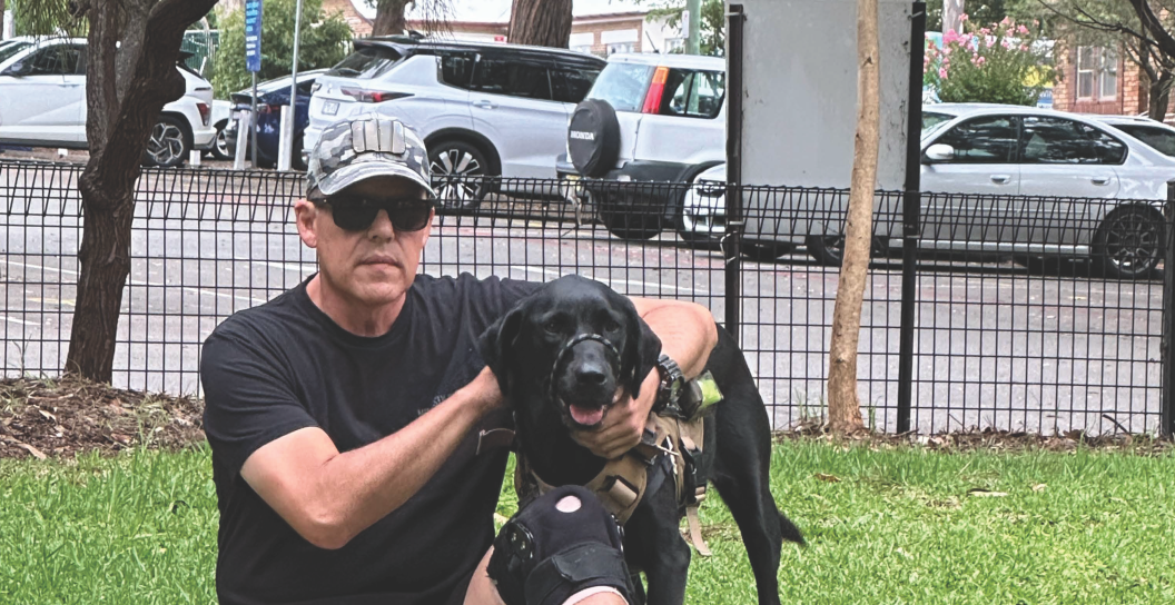 Edward and his assistance dog Poppy