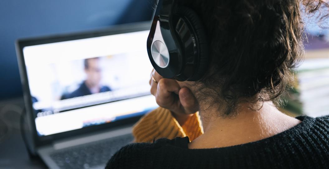 woman watches online session
