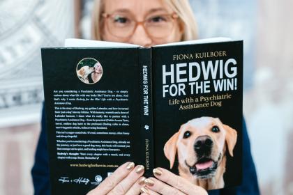 Female veteran with book 