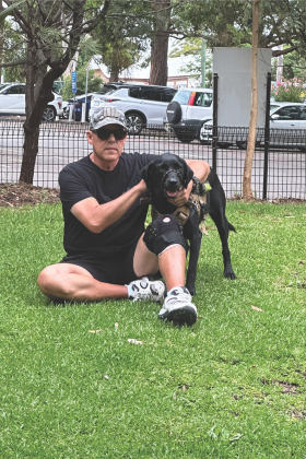 Edward and his assistance dog Poppy